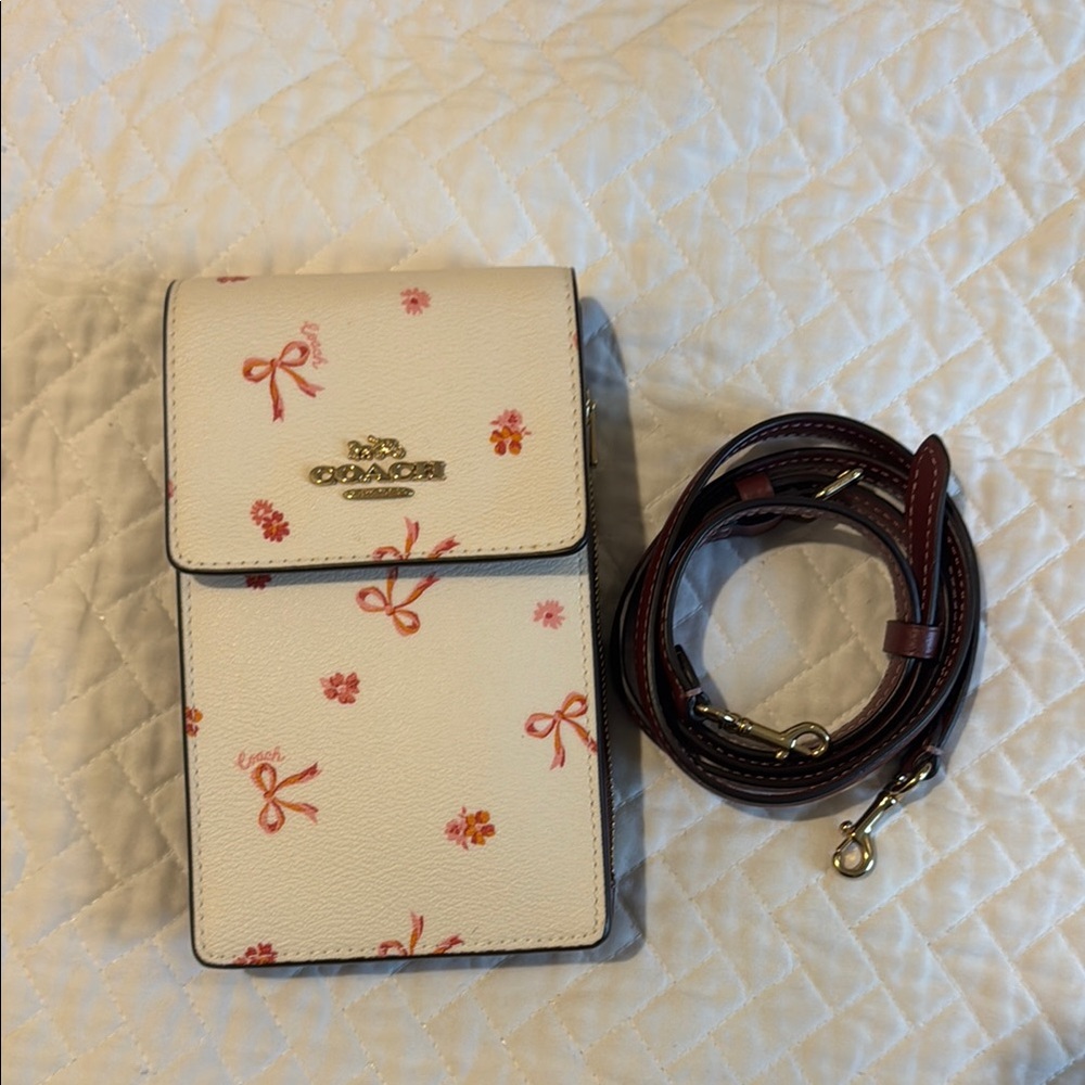 Coach Clara bow print phone strap bag